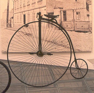 Penny-farthing high-wheel bicycle — the origin of gear inches as a measurement, photographed in the Škoda Auto Museum