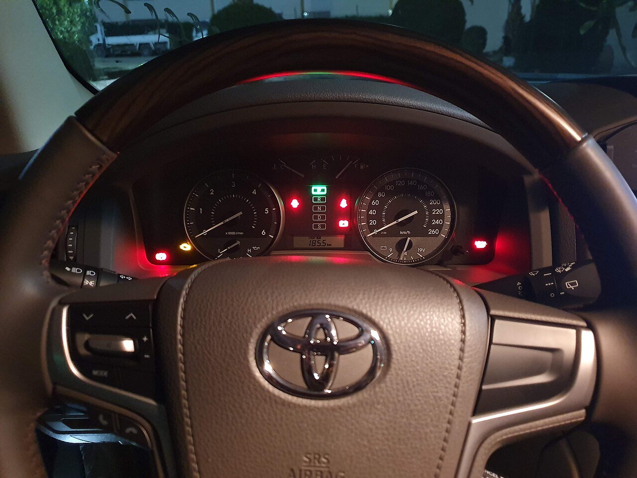 Full instrument cluster on a cable-era dashboard — what a speedometer gear chart keeps honest